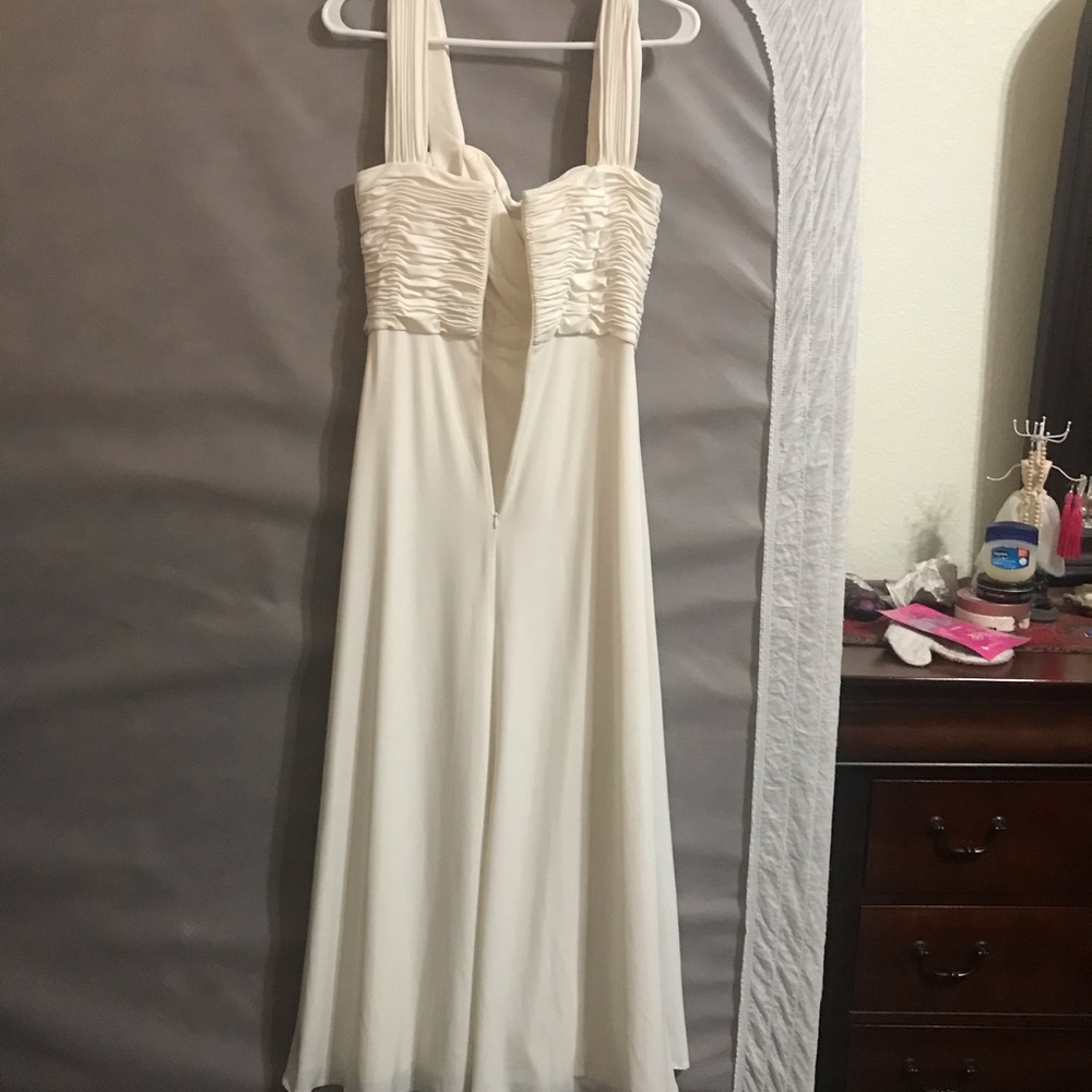 Cream color gown , worn only once